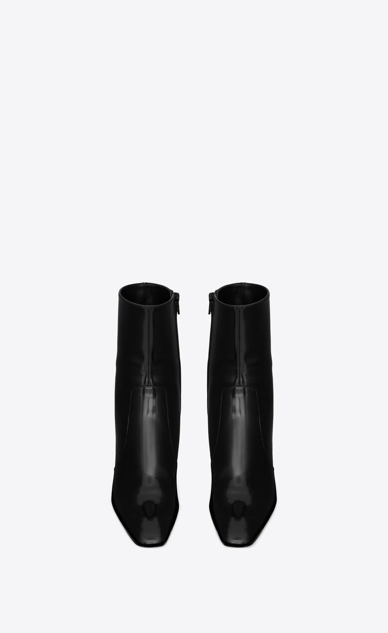Boots "Betty bottines en cuir glacé Noir" SAINT LAURENT